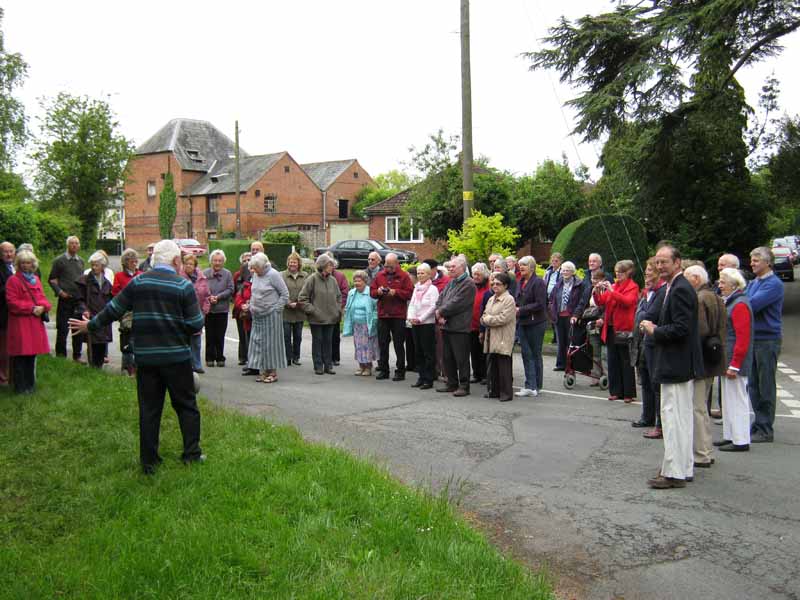 Villagers gathering  outside the nursery